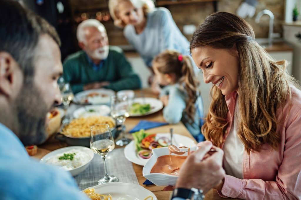 Family sharing an affordable home-cooked meal